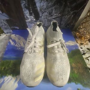 Men’s white sneakers. Lightly used condition. Size 11.